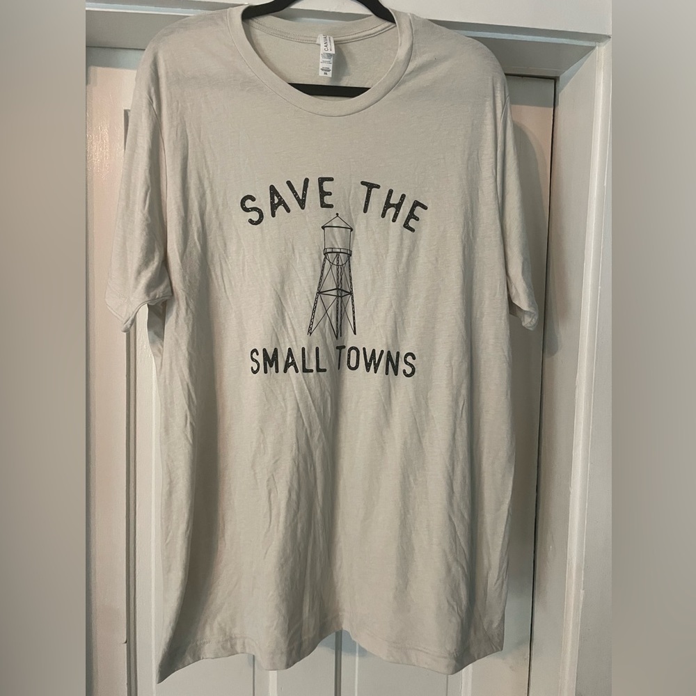 Save the Small Towns cream colored tshirt